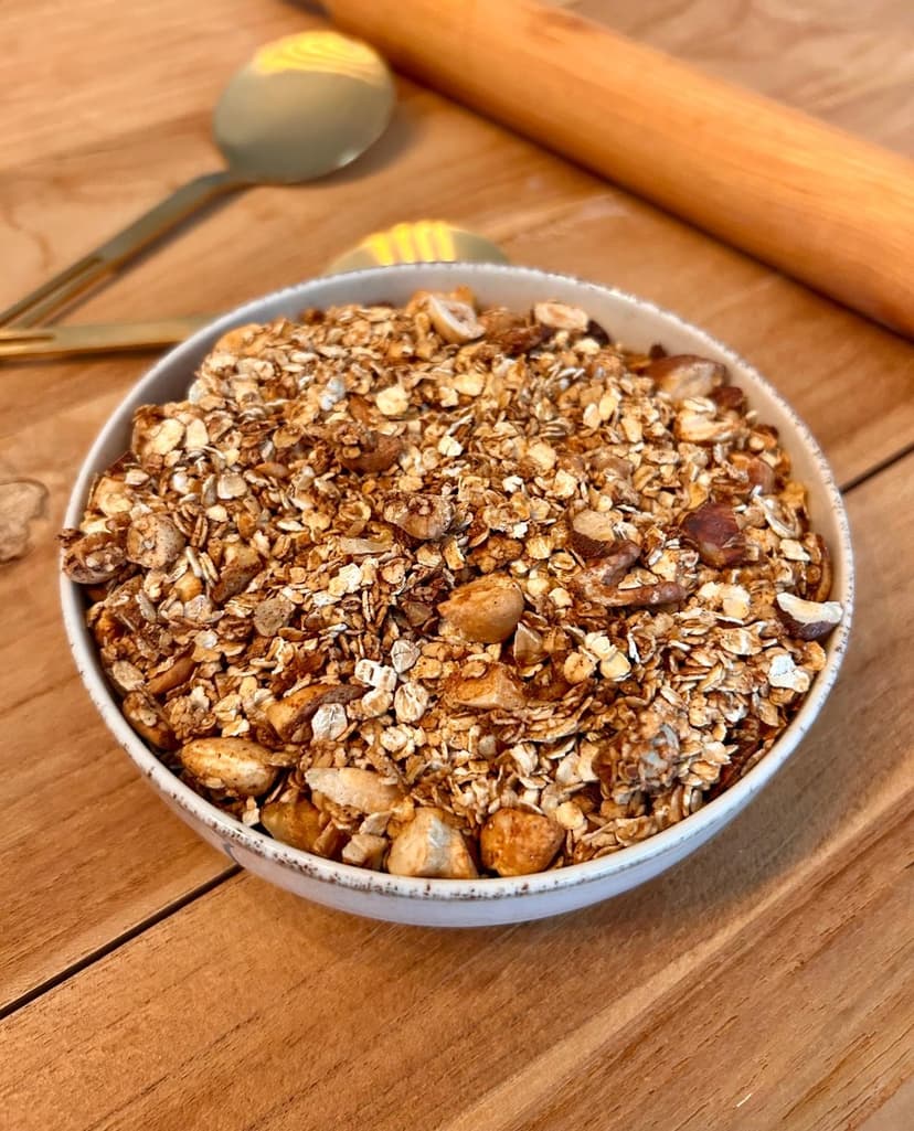 Delicious homemade granola with honey, oats, and mixed nuts. Perfect for a healthy breakfast or snack. Enjoy crunchy goodness in every bite!